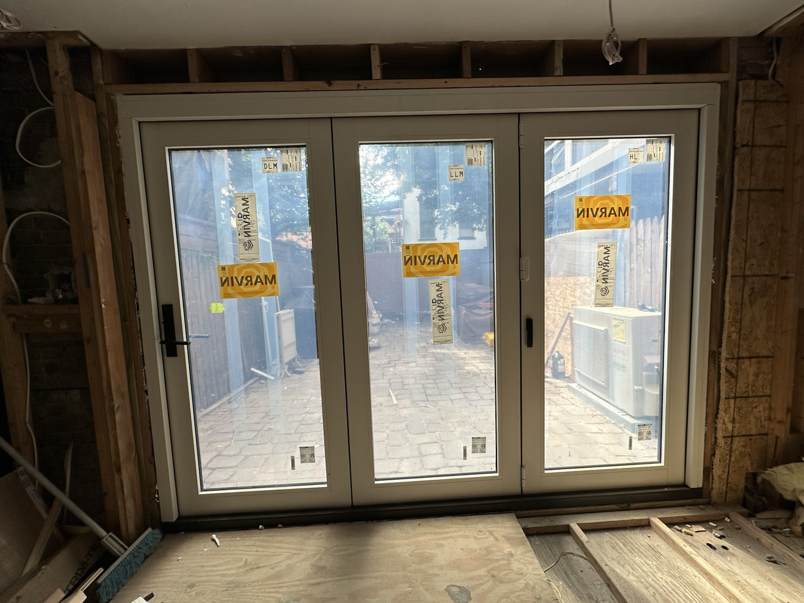 Interior view of a folding patio door installation