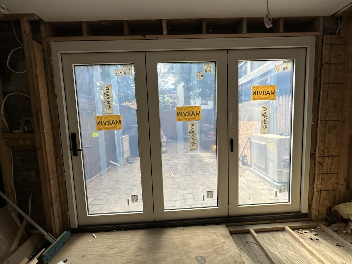 Project step 8: completed folding-door installation viewed from inside